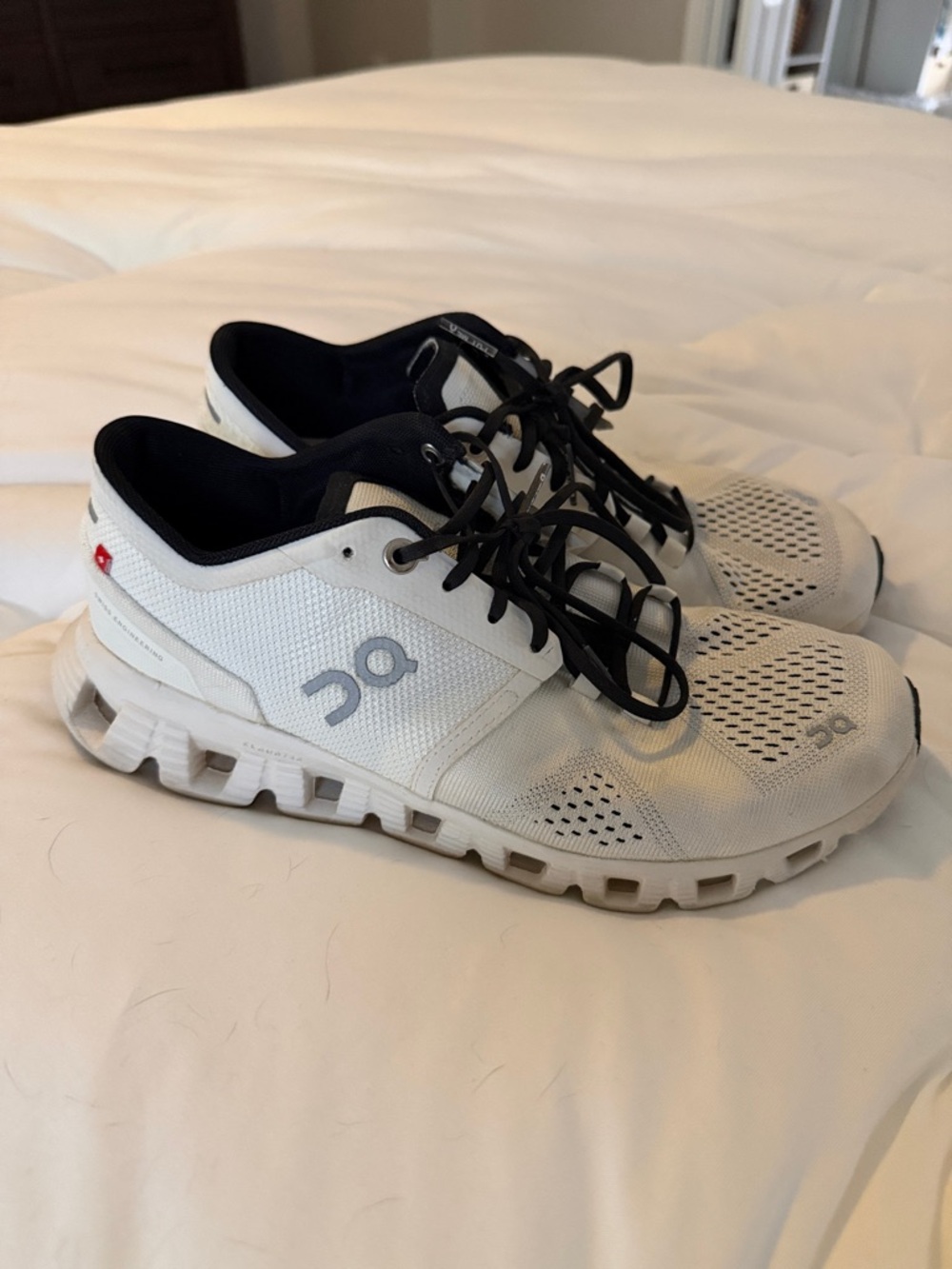 On Running White and Black shoes
